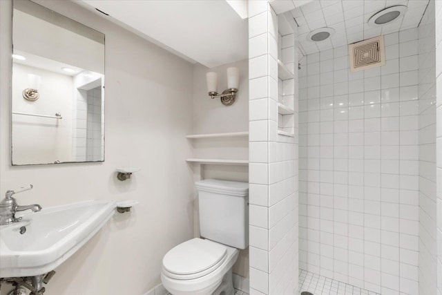 320 Putnam Ave, Port Chester, NY 10573 - full bathroom featuring toilet, a tile shower, and a sink