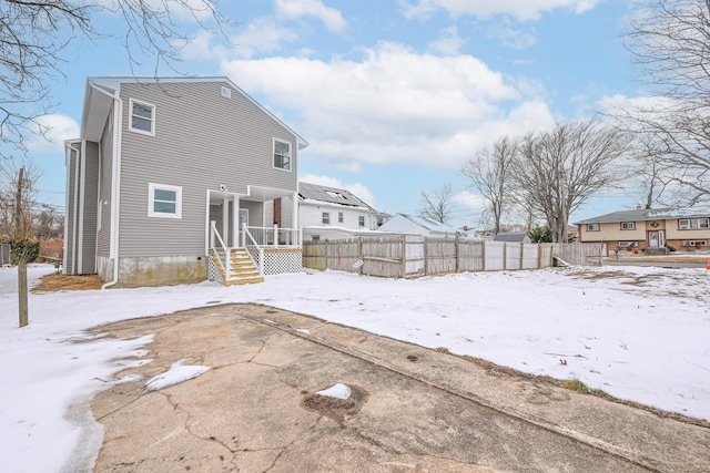 view of snow covered house