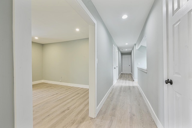 corridor featuring light hardwood / wood-style flooring