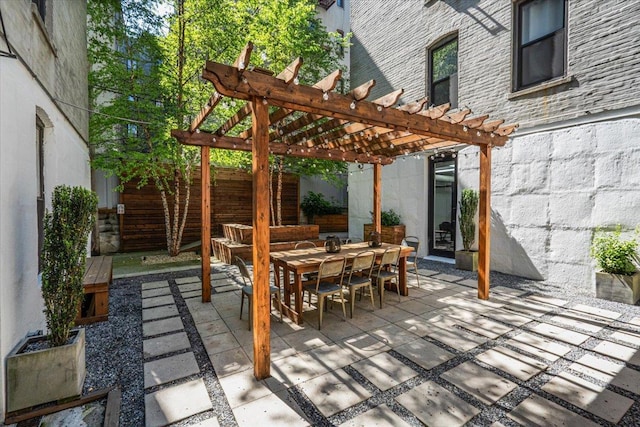 view of patio featuring a pergola