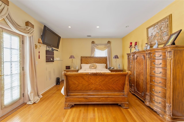 bedroom with light hardwood / wood-style flooring