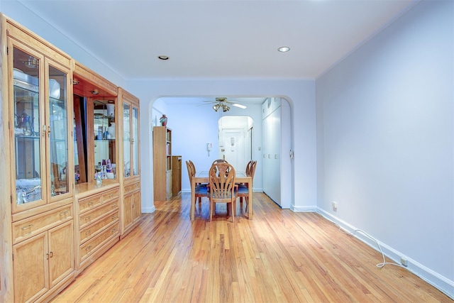 dining room featuring ceiling fan and light wood-type flooring