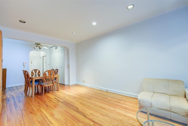 dining space featuring ceiling fan and light hardwood / wood-style floors