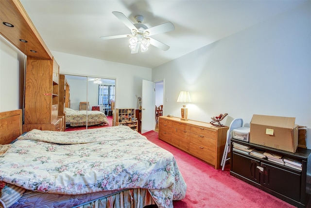 carpeted bedroom with a closet and ceiling fan