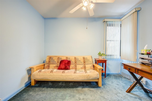 interior space featuring carpet and ceiling fan