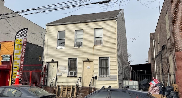 view of front of house with cooling unit