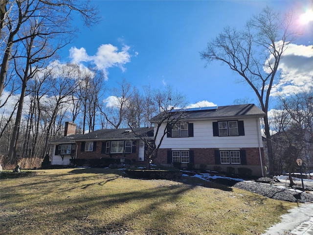 view of front of property with a front lawn