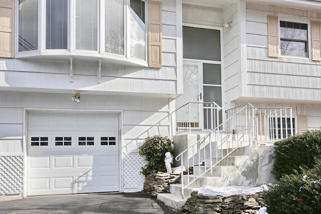 property entrance with a garage