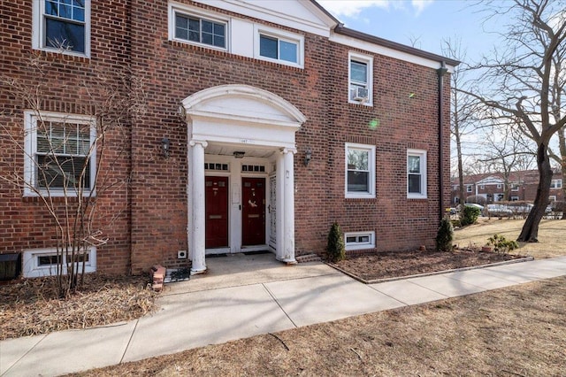 view of front of property featuring brick siding