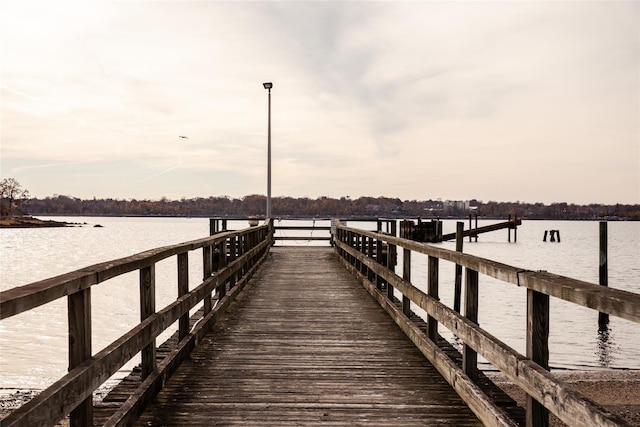 view of dock with a water view