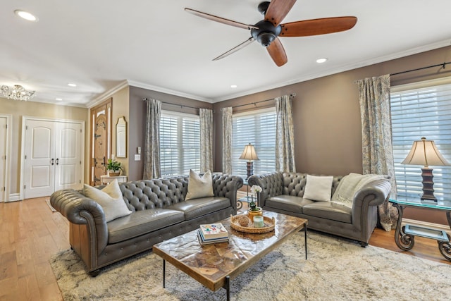 living area featuring ceiling fan, ornamental molding, wood finished floors, and recessed lighting