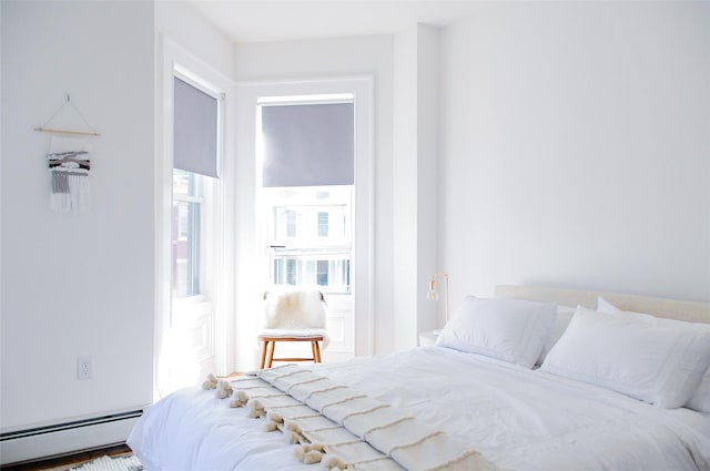 bedroom featuring a baseboard radiator