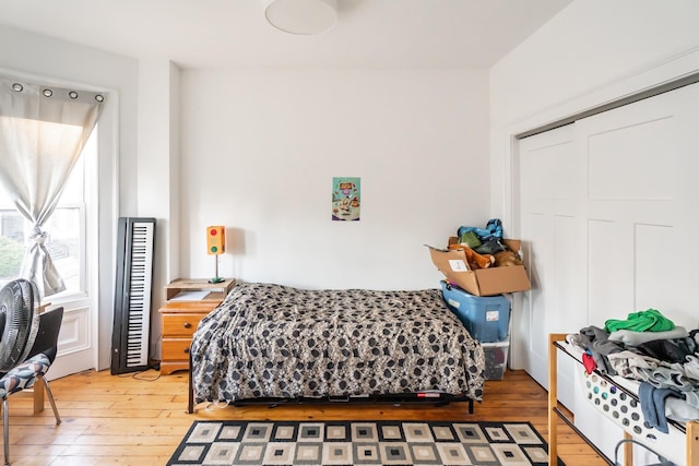 bedroom featuring hardwood / wood-style floors