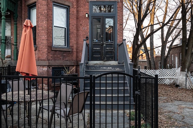 entrance to property featuring french doors