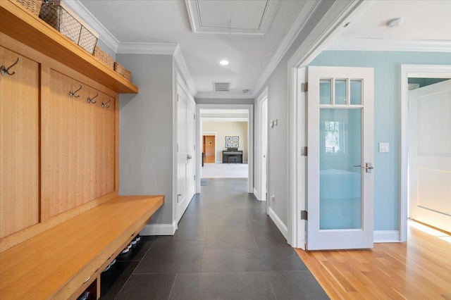 mudroom featuring crown molding and wood-type flooring