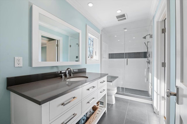 bathroom featuring tile patterned flooring, toilet, an enclosed shower, crown molding, and vanity