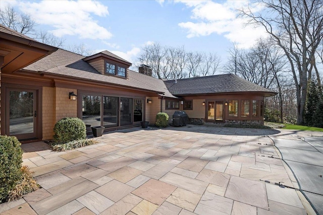 back of house featuring a patio