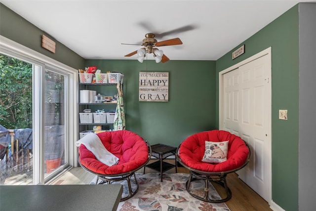 106 Williams Way S, Baiting Hollow, NY 11933 - sitting room with ceiling fan and wood finished floors