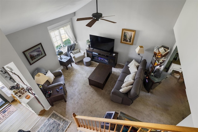 106 Williams Way S, Baiting Hollow, NY 11933 - carpeted living area with lofted ceiling and ceiling fan