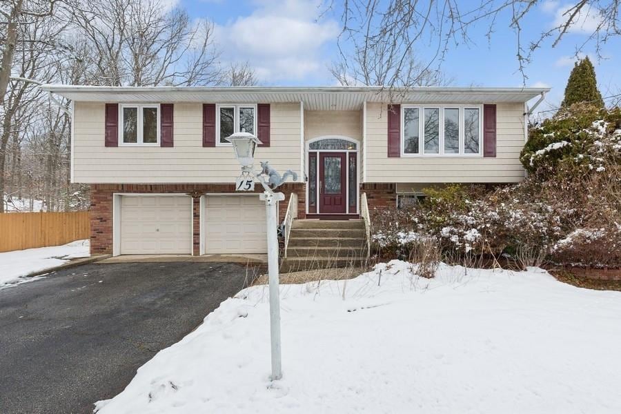 split foyer home featuring a garage