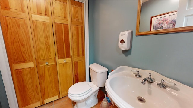 2 Bridle Path, Westhampton Beach, NY 11978 - bathroom with a sink, tile patterned flooring, a closet, and toilet