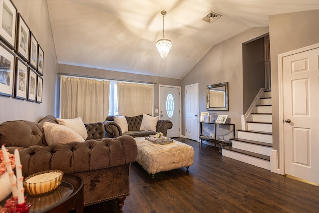living room with lofted ceiling and dark hardwood / wood-style floors