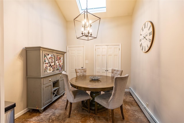 dining area featuring high vaulted ceiling, a baseboard heating unit, a chandelier, and a skylight