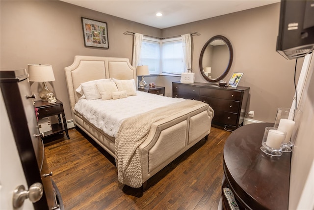 bedroom featuring dark hardwood / wood-style floors