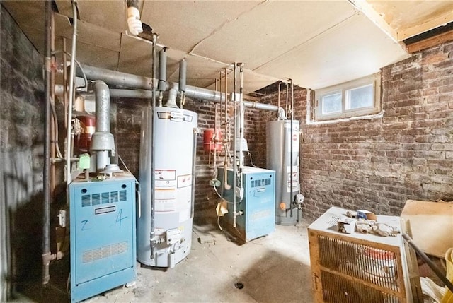 utility room featuring water heater
