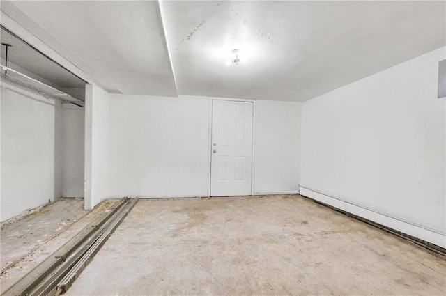 basement with a baseboard heating unit