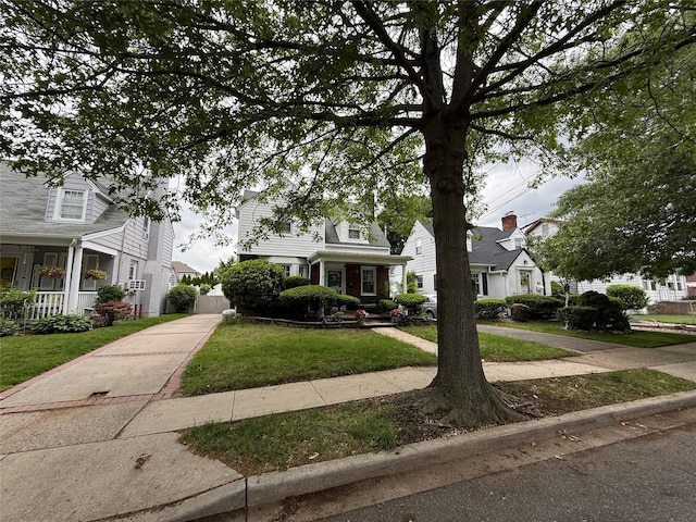 204 N Grove St, Valley Stream, NY 11580 - view of front of house with a front yard and a residential view