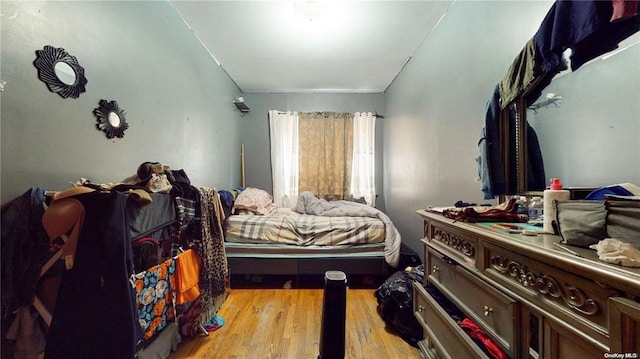 bedroom featuring light wood-type flooring