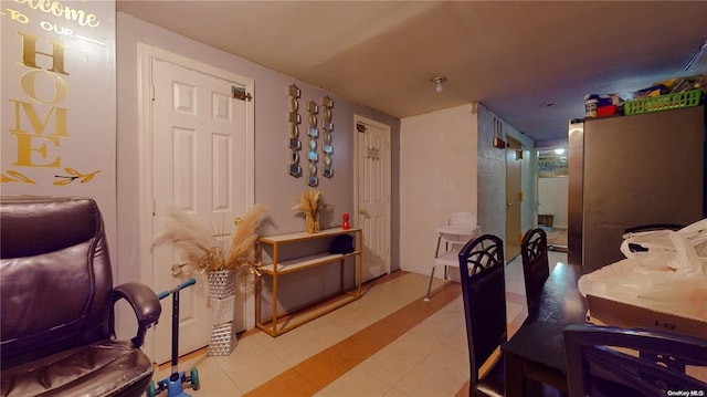 interior space featuring light tile patterned flooring