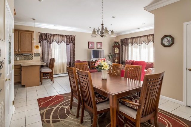 dining area featuring baseboards, a chandelier, crown molding, a baseboard heating unit, and light tile patterned flooring