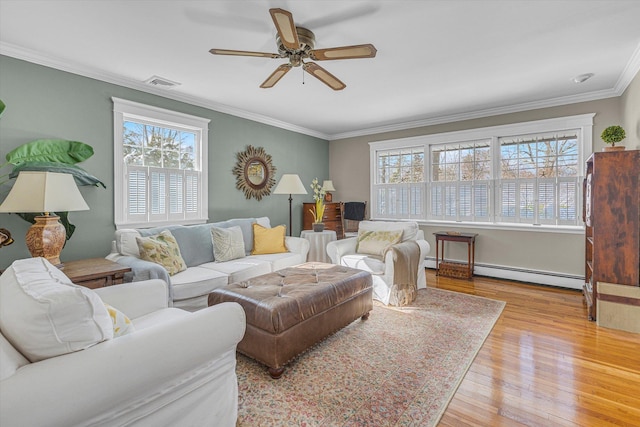 living room featuring a baseboard radiator, ceiling fan, crown molding, and light hardwood / wood-style flooring