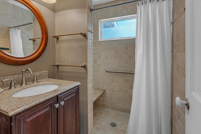 bathroom featuring vanity and a shower with curtain