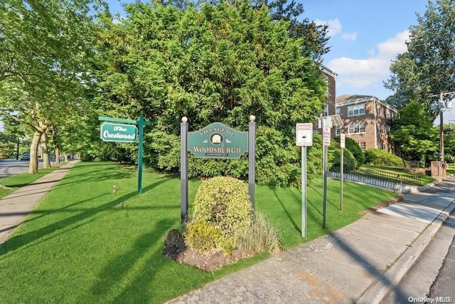 view of community featuring a lawn