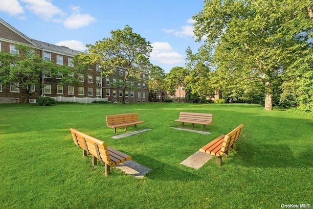 view of community featuring a yard