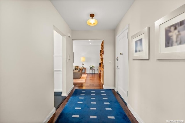 hallway featuring dark hardwood / wood-style floors