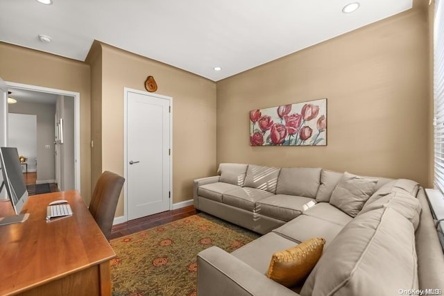 living room with dark hardwood / wood-style flooring