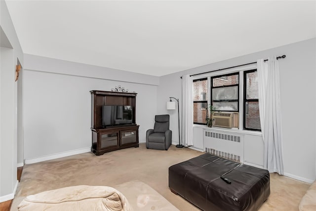 carpeted living room featuring radiator heating unit and cooling unit