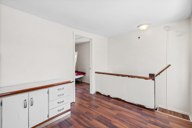 interior space with dark hardwood / wood-style floors