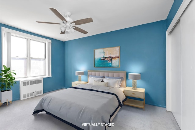 209-20 18th Ave Unit 6C, Bayside, NY 11360 - carpeted bedroom with radiator heating unit, baseboards, a closet, and a ceiling fan