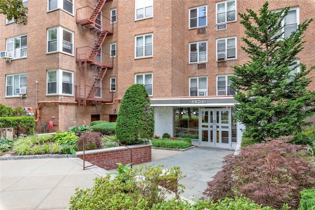 209-20 18th Ave Unit 6C, Bayside, NY 11360 - view of apartment building / complex featuring cooling unit