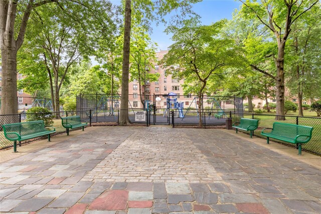 209-20 18th Ave Unit 6C, Bayside, NY 11360 - view of home's community with a gate