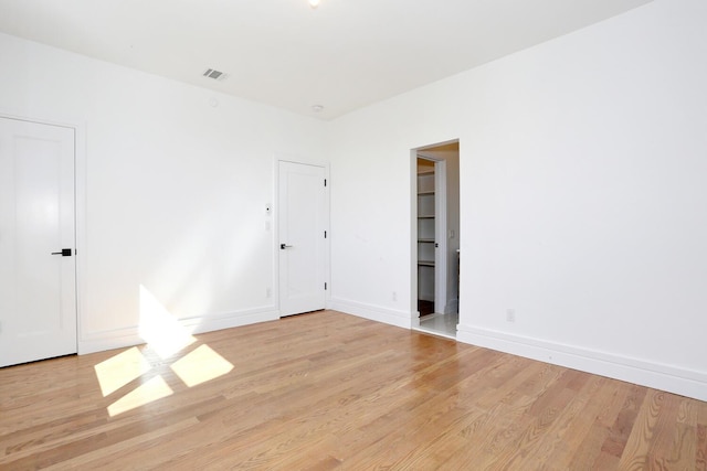 empty room featuring light hardwood / wood-style floors