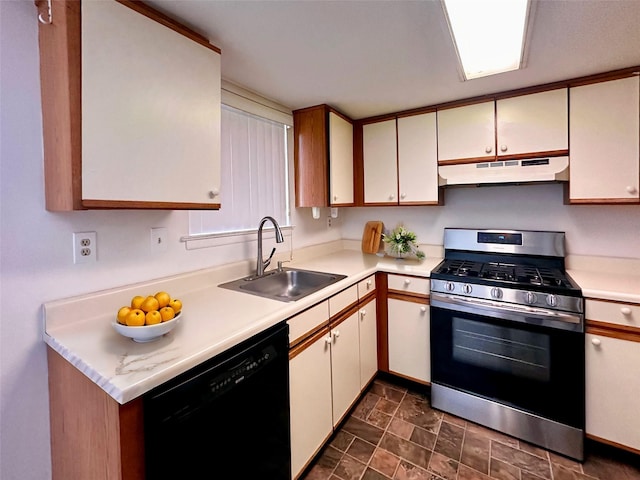 kitchen with stainless steel range with gas cooktop, black dishwasher, and sink