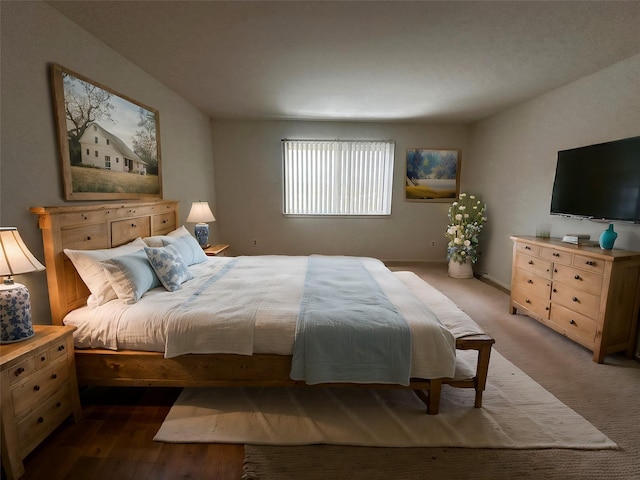 bedroom with dark wood-type flooring