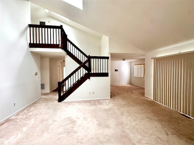 interior space featuring high vaulted ceiling