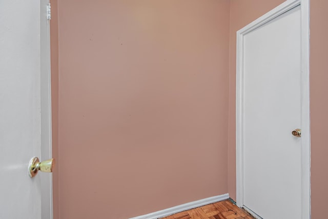 interior space featuring baseboards